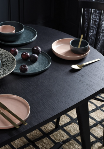 nona pink plates from Habitat on black dining table with black dining chair on large check black and jute rug