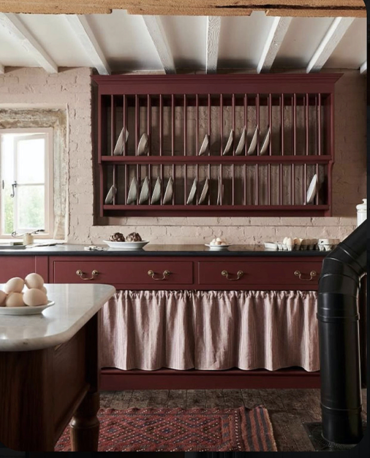https://www.madaboutthehouse.com/wp-content/uploads/2022/01/skirts-on-kitchen-cupboards-via-devol.jpg